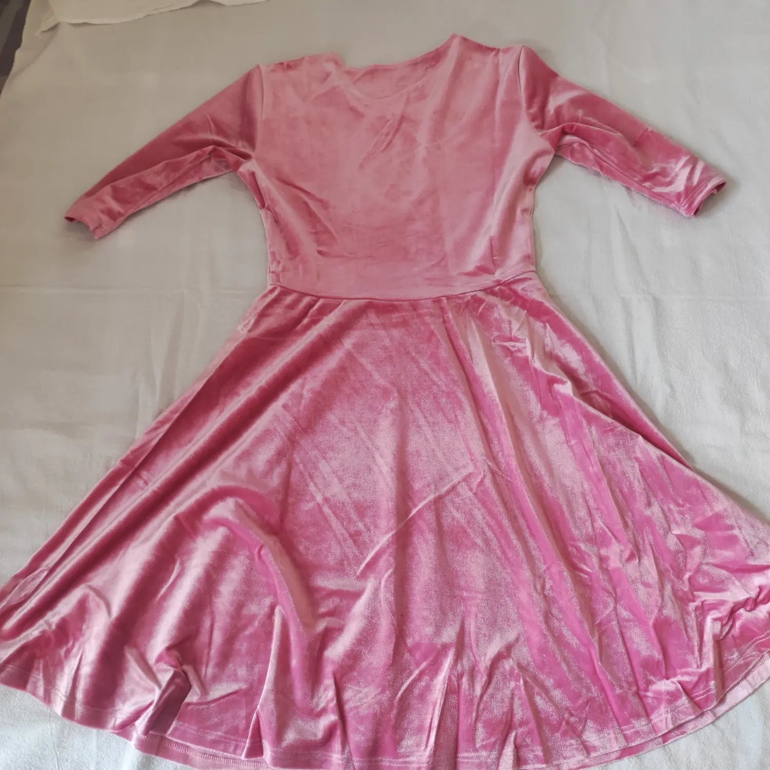 back-flatlay-view | Flat lay back view pink velvet midi dress, three quarter sleeves, high waist flared swing skirt