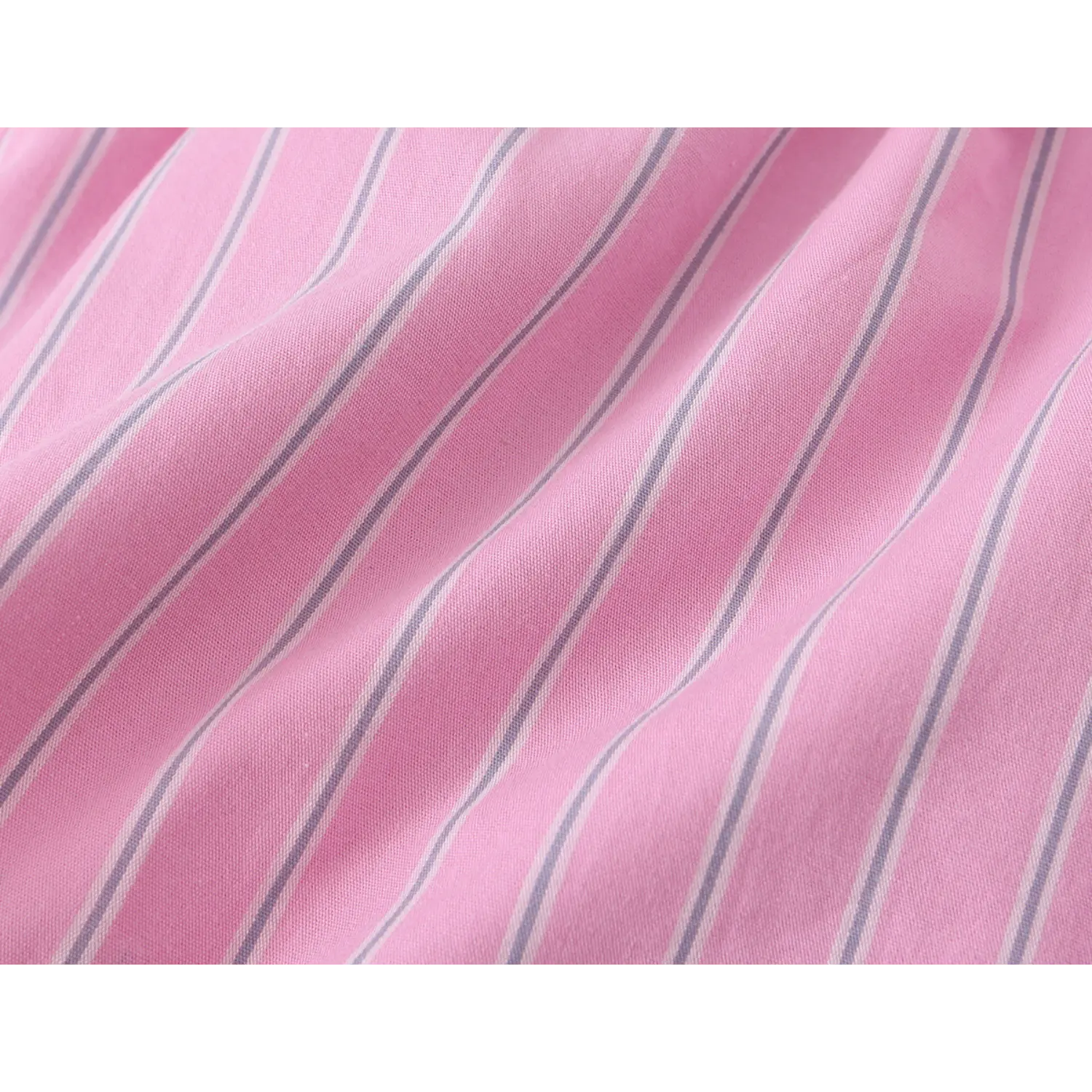 Fabric drape close-up, soft matte pink woven cloth with thin vertical multi stripe pattern