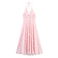 Front full view of pink halter maxi dress with 3d flower applique