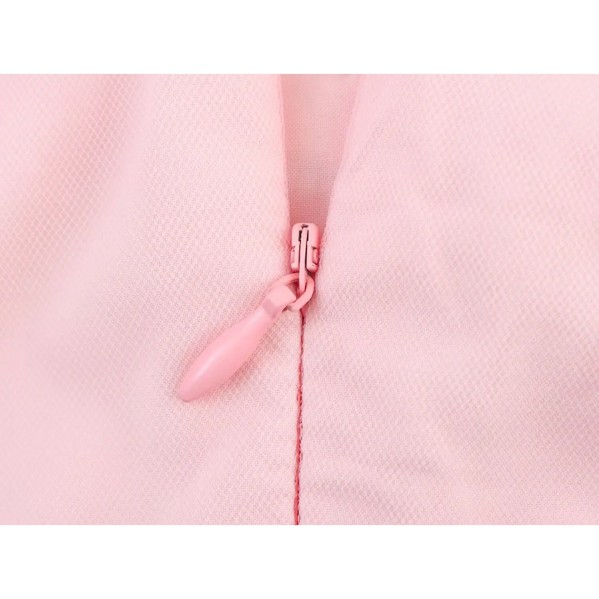 Partial close‑up of pink side zipper