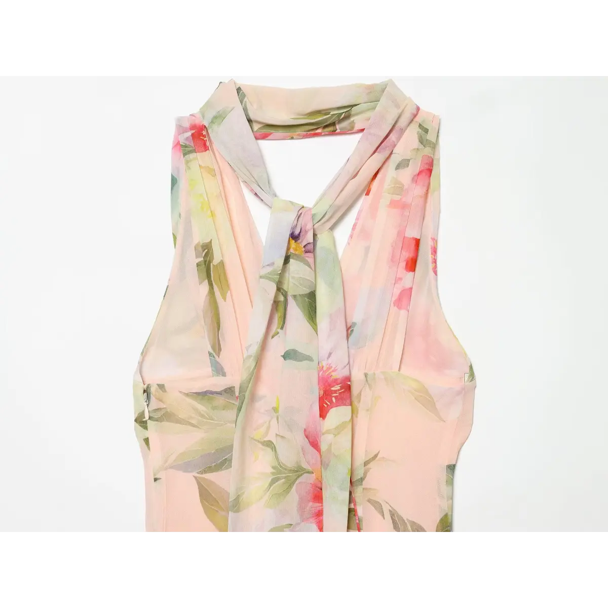 Close‑up of wrapped halter neck design with floral chiffon fabric