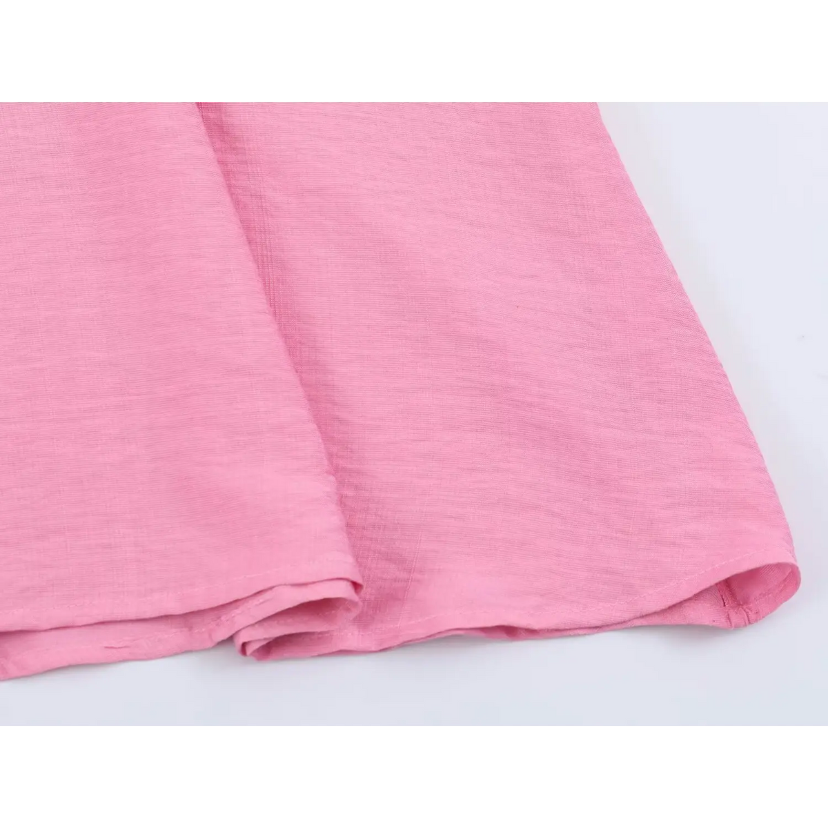 Detailed shot of dress hem and fabric stitching