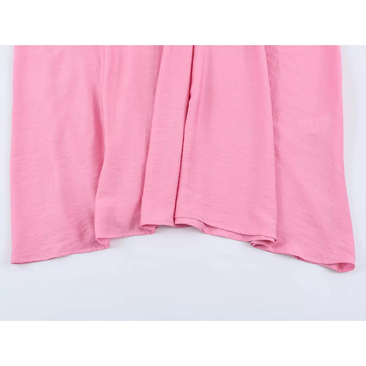 Partial view of loose flowy maxi skirt hem