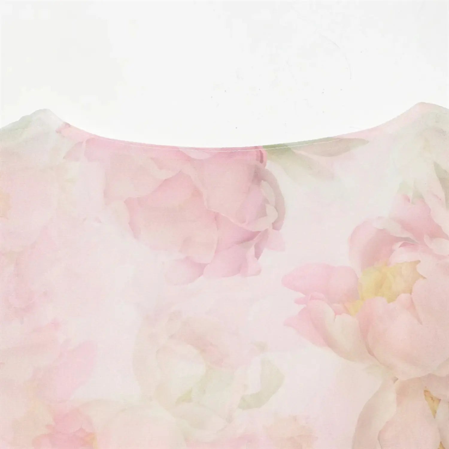 Partial back neck view of watercolor floral print fabric