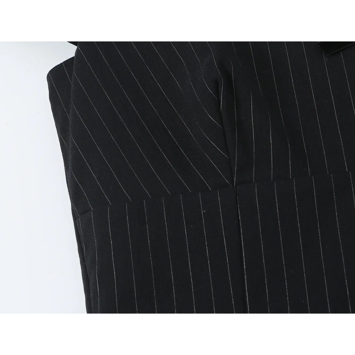 Close-up of princess seam and waist shaping detail