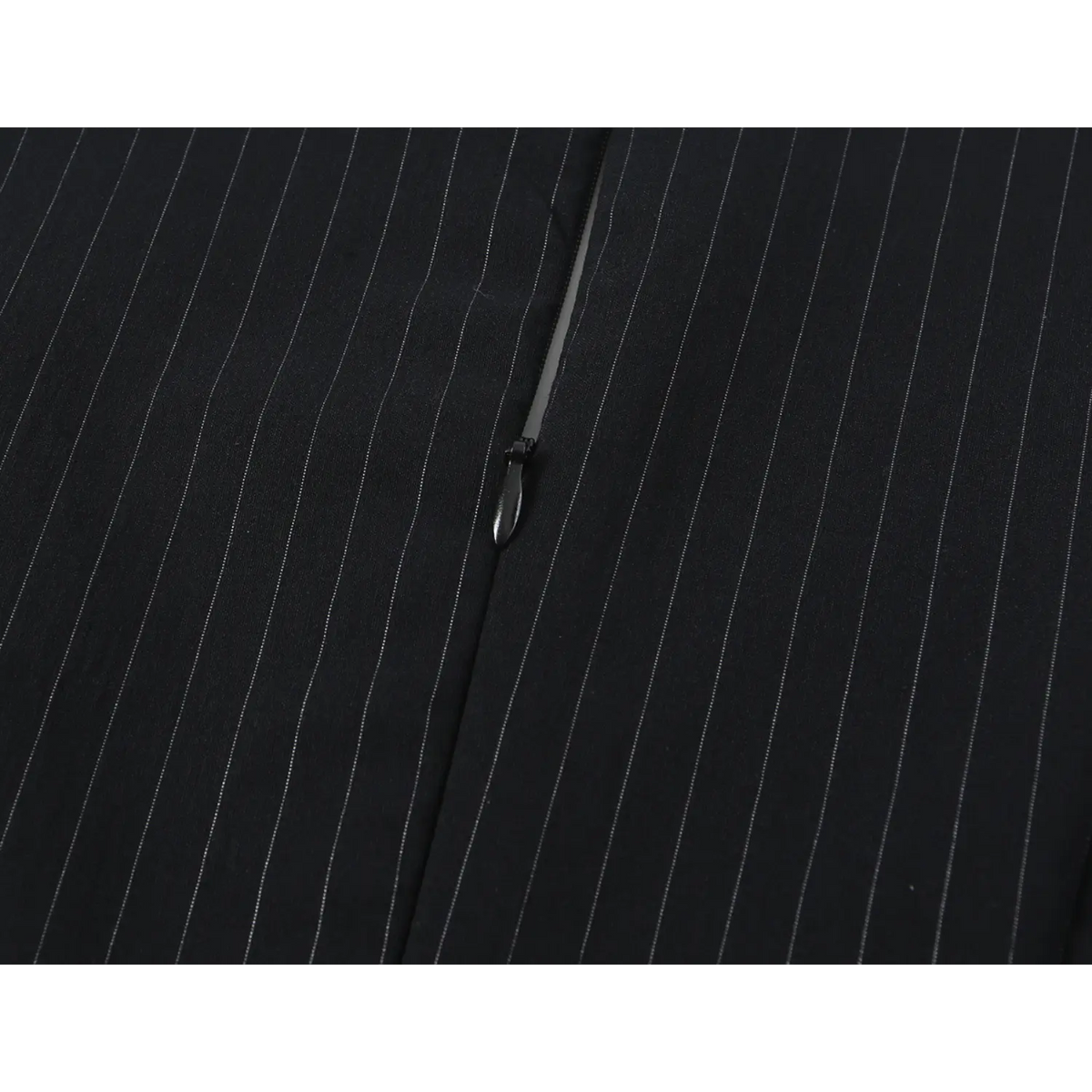 Close-up of back zipper pull detail