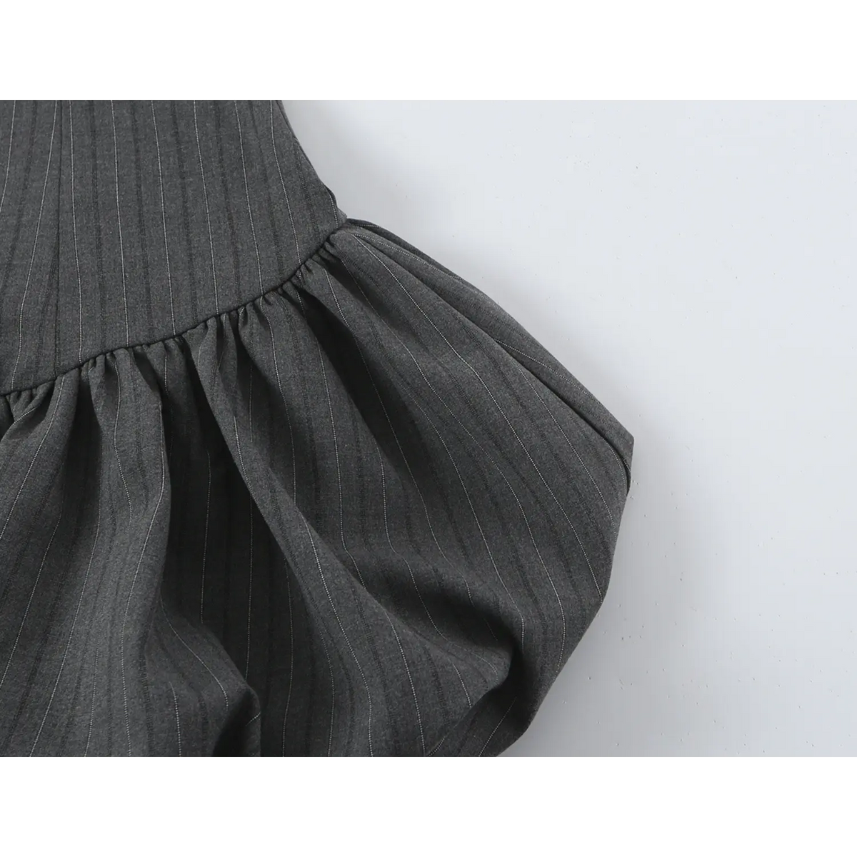 Close-up of gathered waist seam
