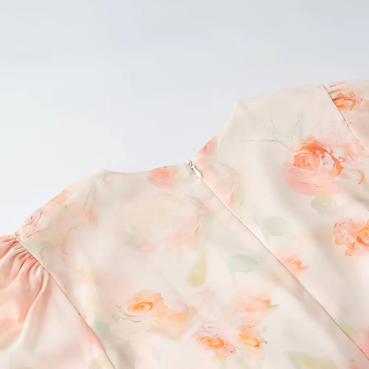 Close-up of back neck zipper and shoulder seam