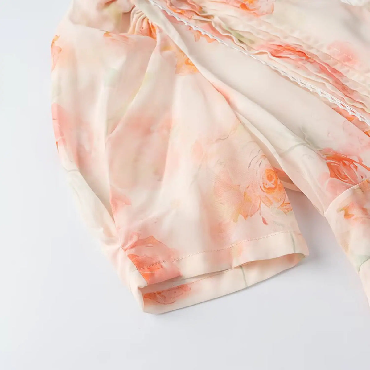 Close-up of puff short sleeve cuff and chiffon fabric