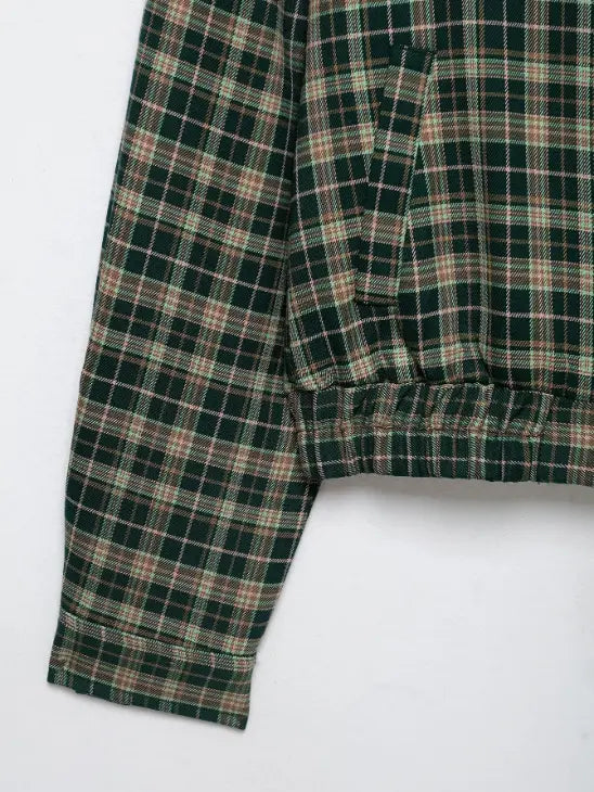 Close-up of slant pocket and elastic hem