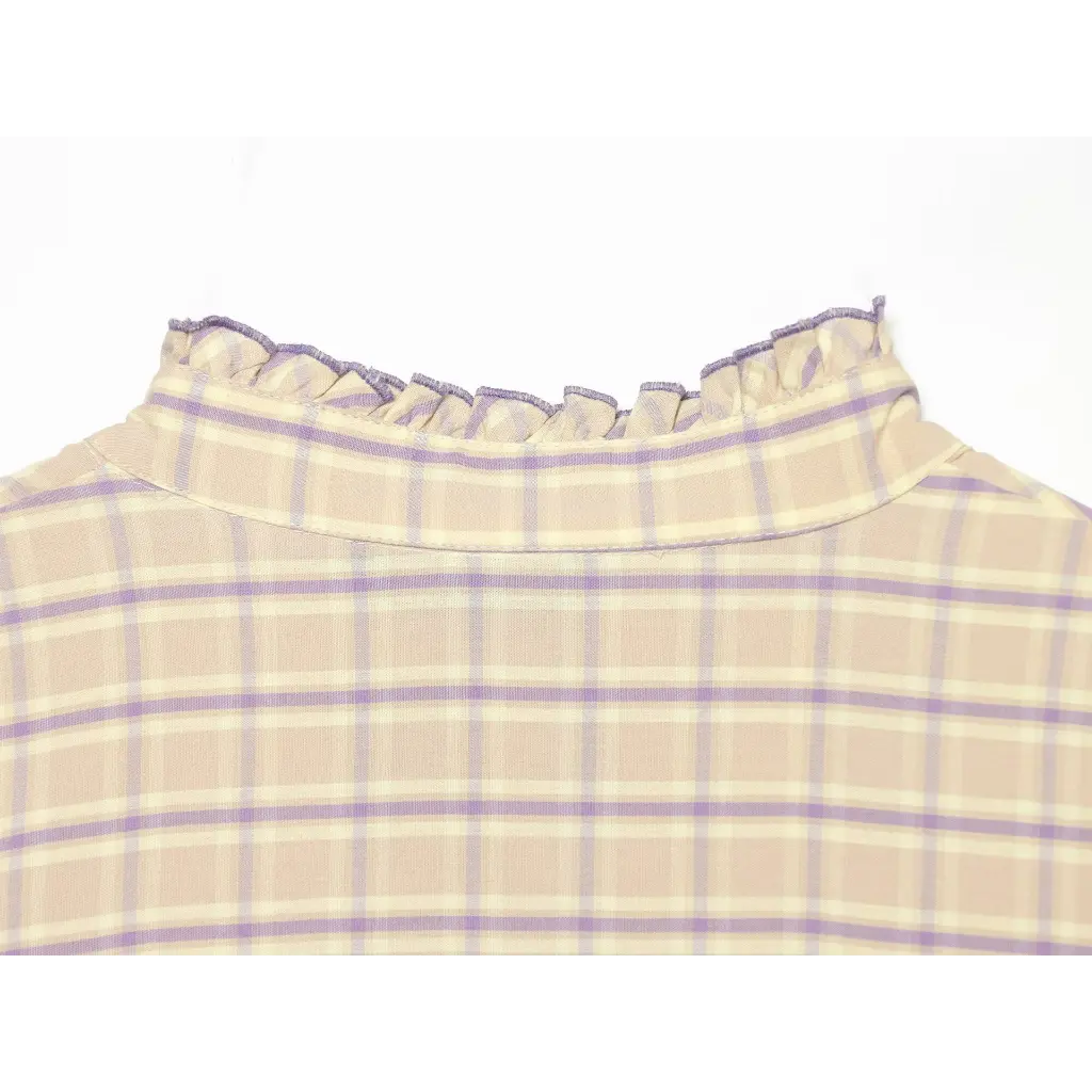 Close-up of back ruffled mock neck