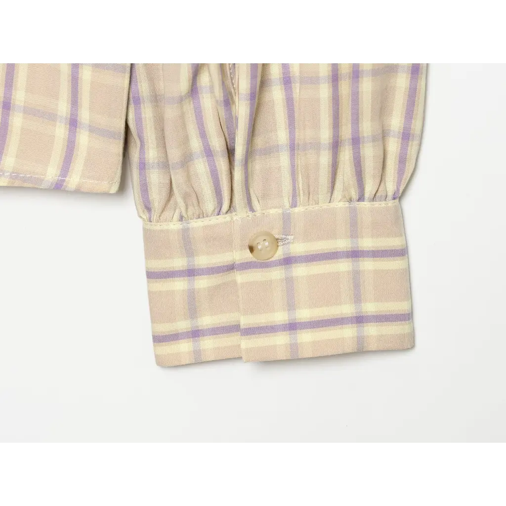 Close-up of cuff button detail