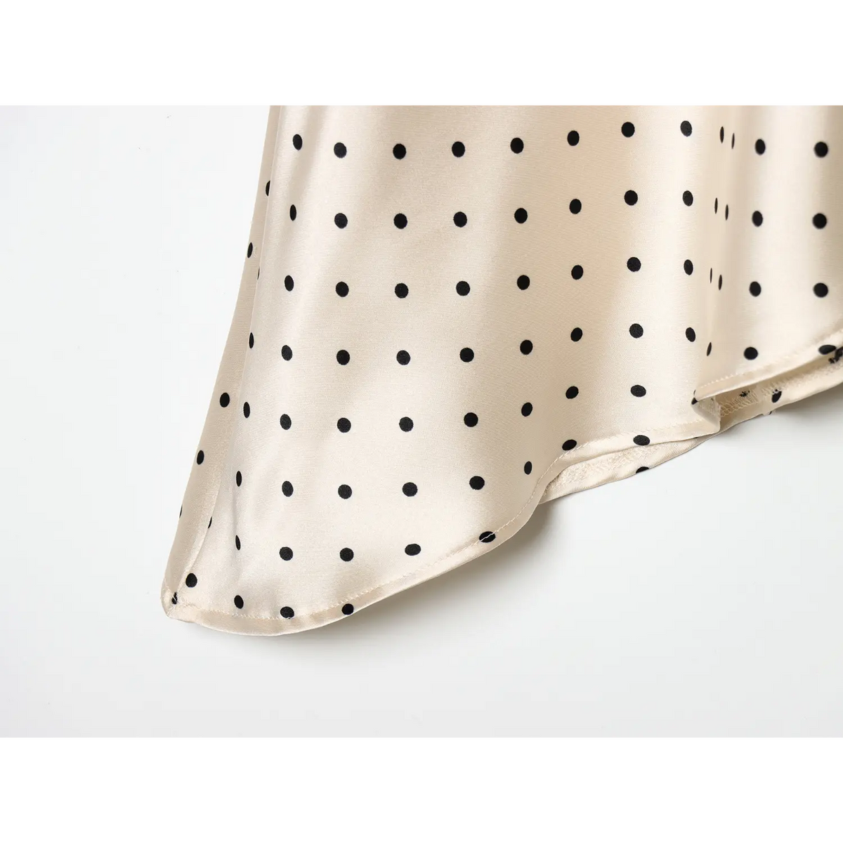 Close-up of draped handkerchief hem corner