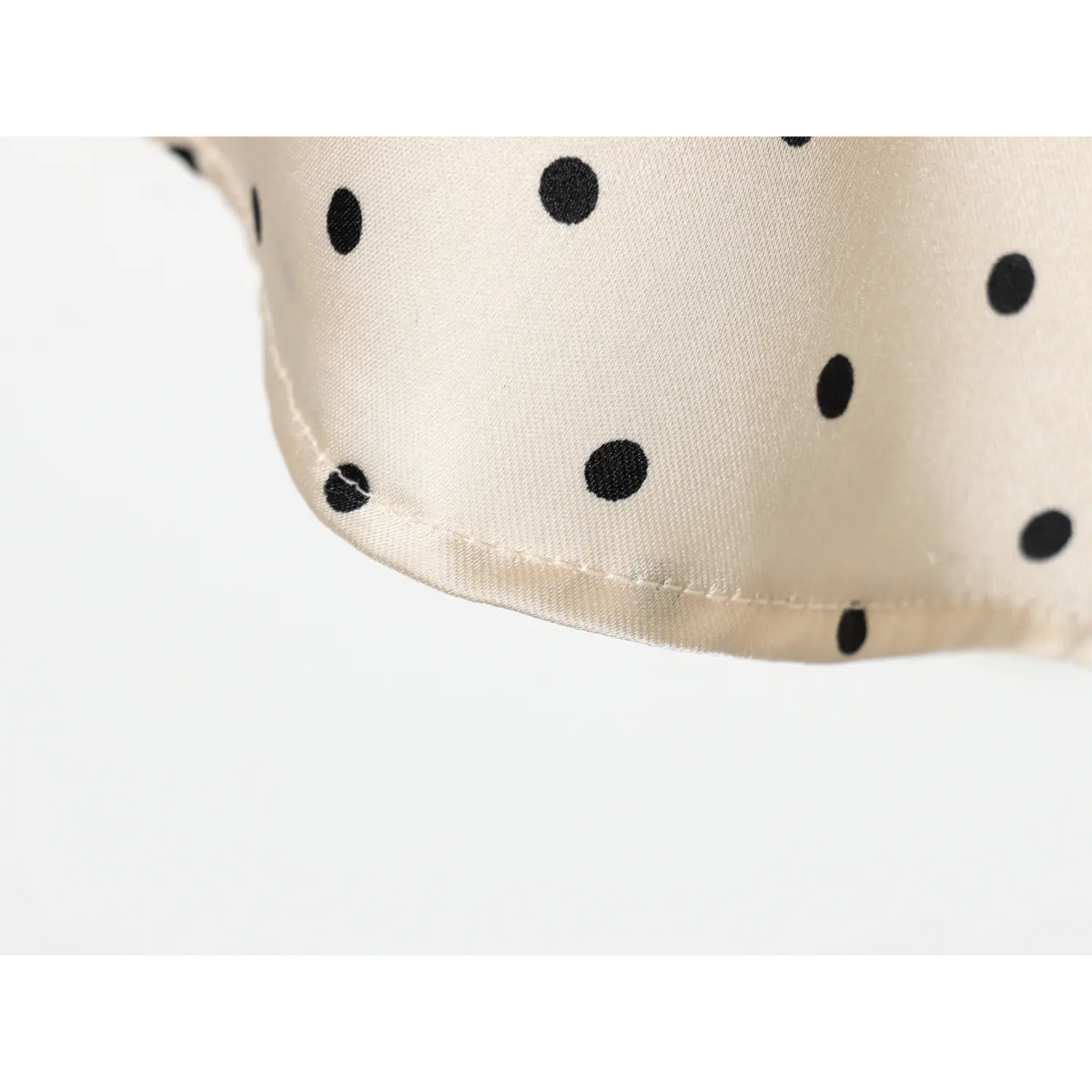 Close-up of rolled hem stitching detail