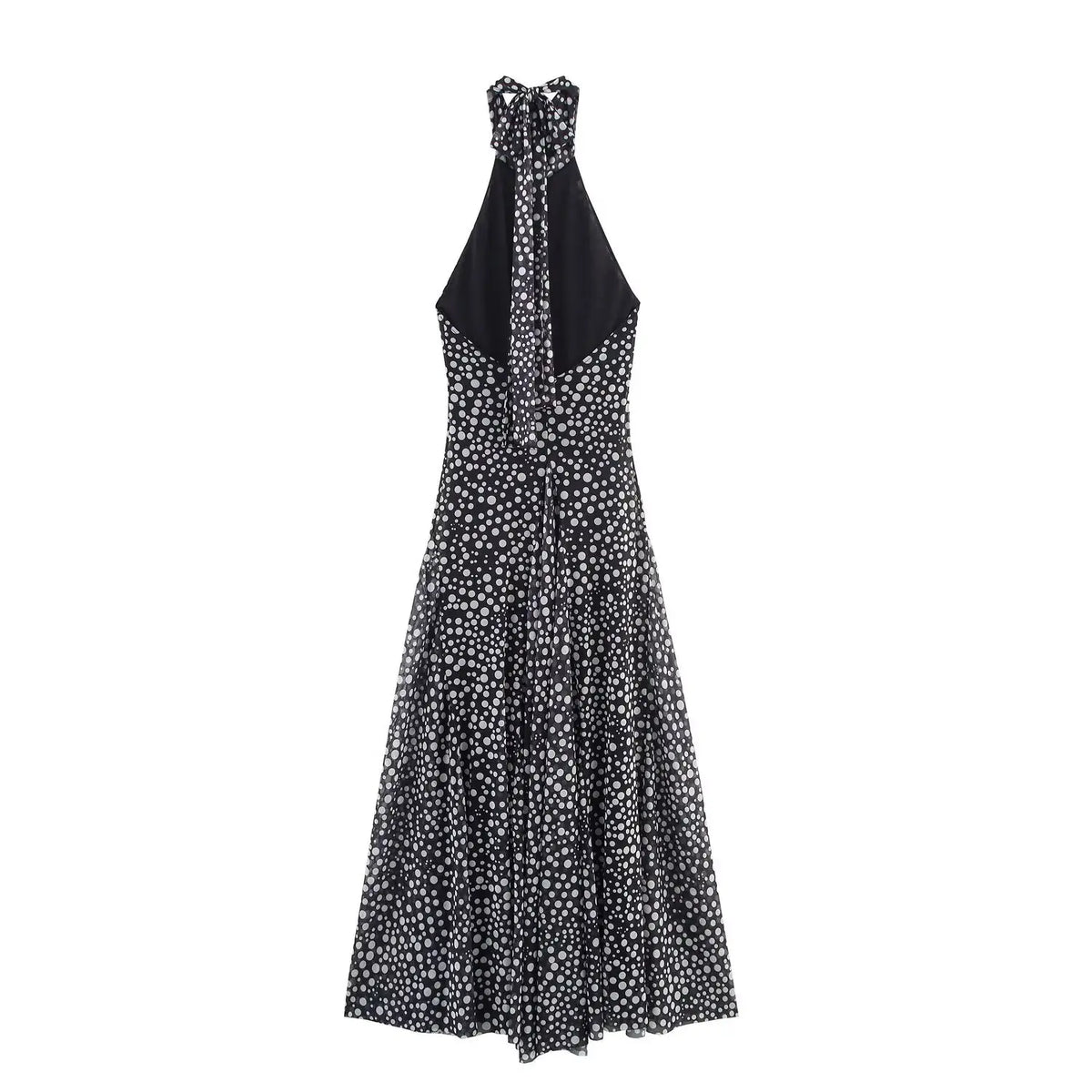 Polka dot halter neck maxi dress back view showing open back with knotted halter straps and inner lining