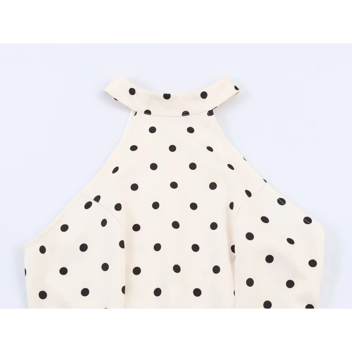 Close-up of halter neckline and shoulder cutout