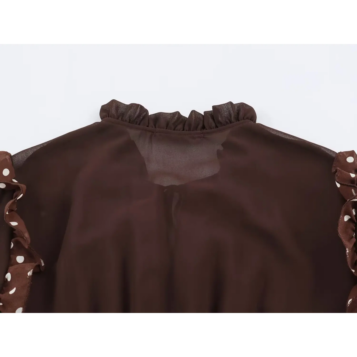 Close-up of back ruffled neckline and centre back seam