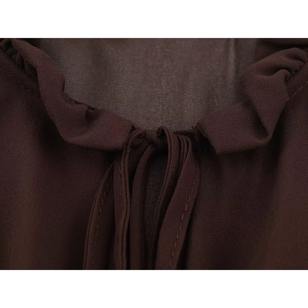 Close-up of self-fabric neck tie