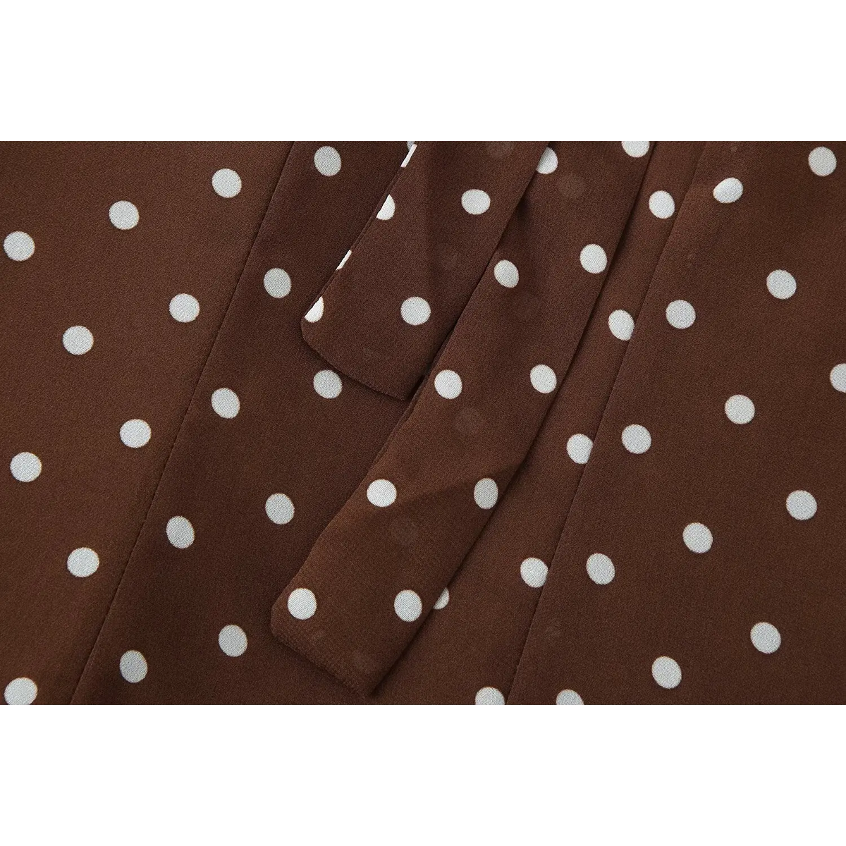 Close-up of tie ribbon ends