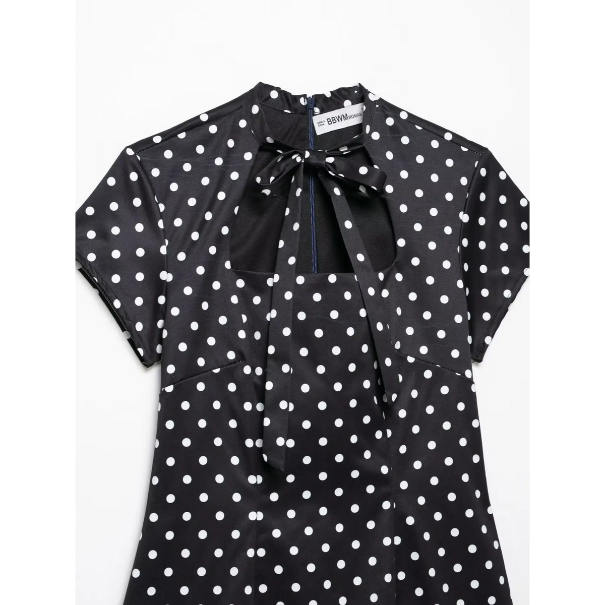 Close-up of stand collar, tie bow and chest cutout