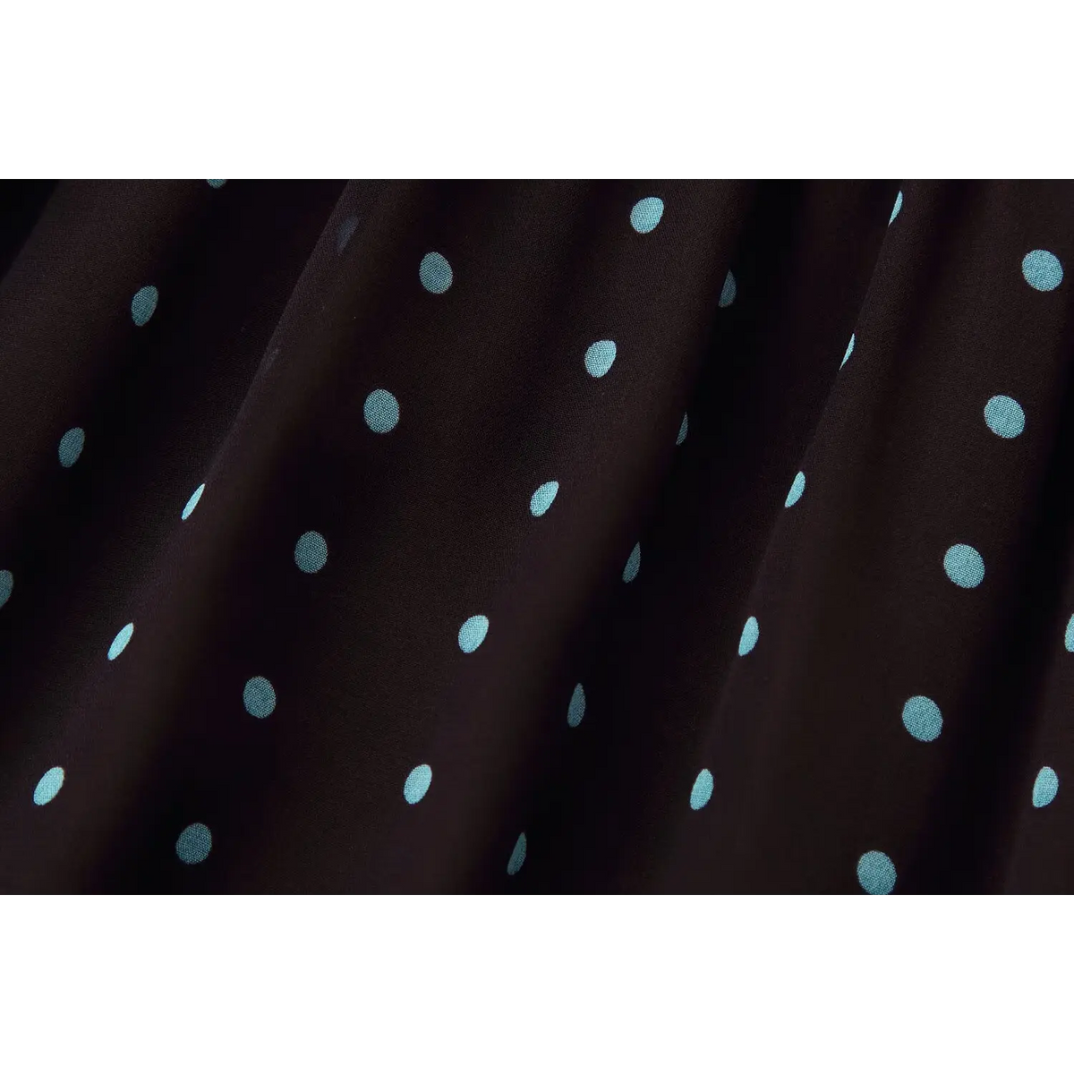Close-up of polka dot chiffon fabric