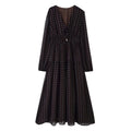Front flat lay of polka dot V neck tie waist tiered chiffon maxi dress