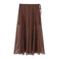 Front flat lay of polka dot wrap tie chiffon midi skirt