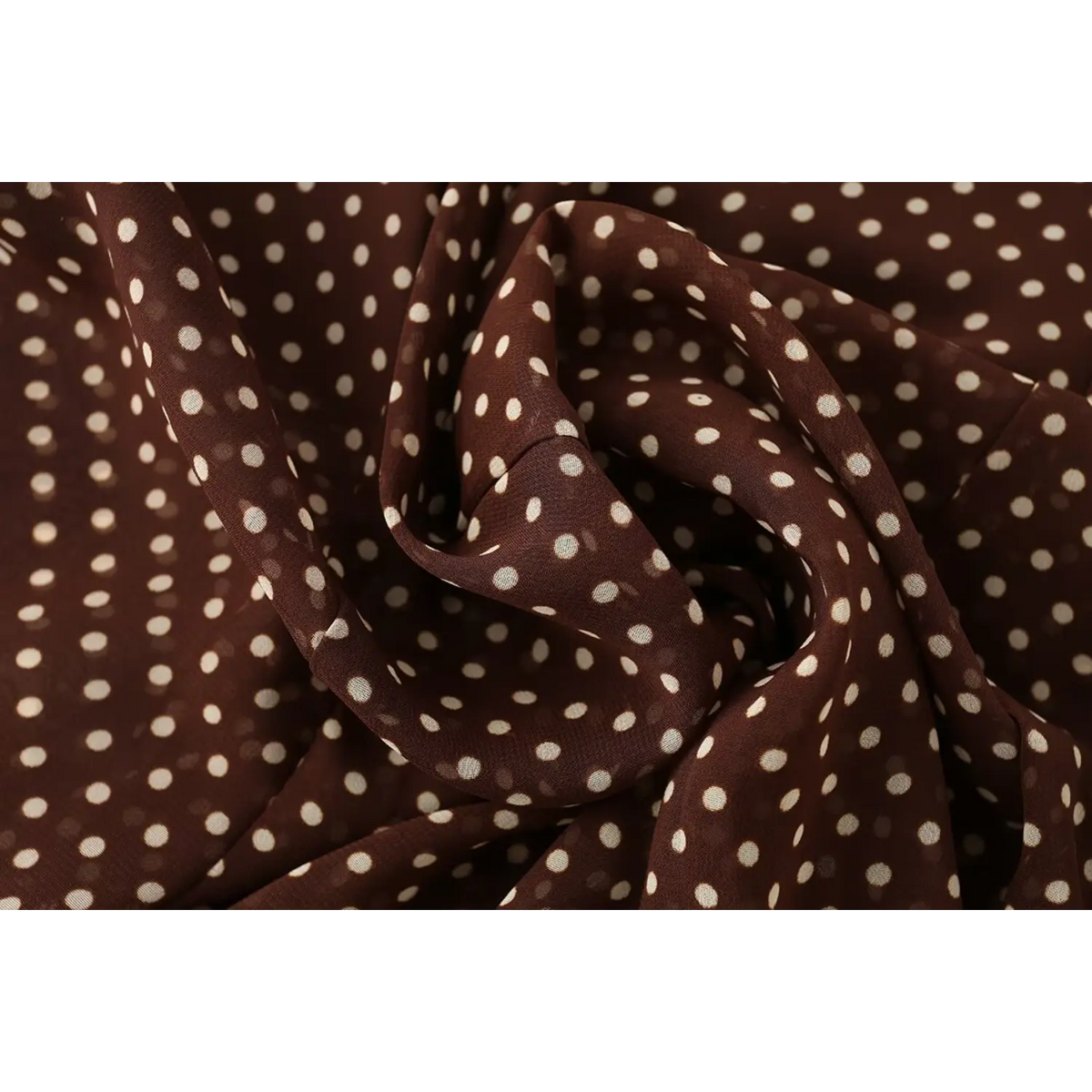 Model wearing polka dot wrap tie chiffon midi skirt, front view