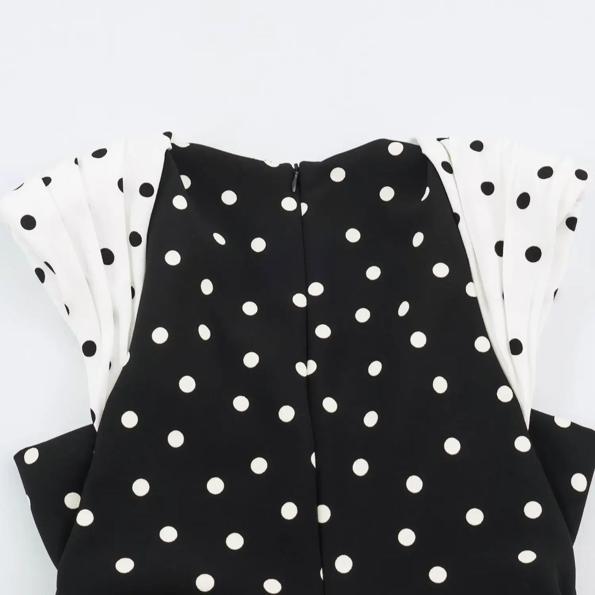 Top view back detail, contrast pleated cap sleeves and concealed center back zipper