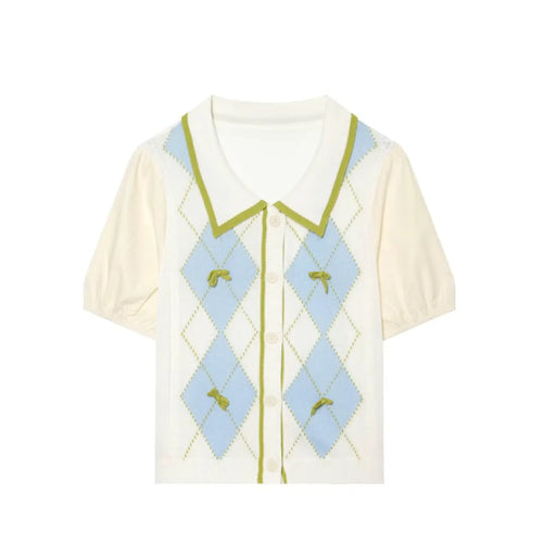 Front full flat lay sweet college style knit blouse, contrast green trim peter pan collar, blue white argyle diamond jacquard, hand-sewn tiny green bows, mixed poplin puff short sleeves, front button down casual top