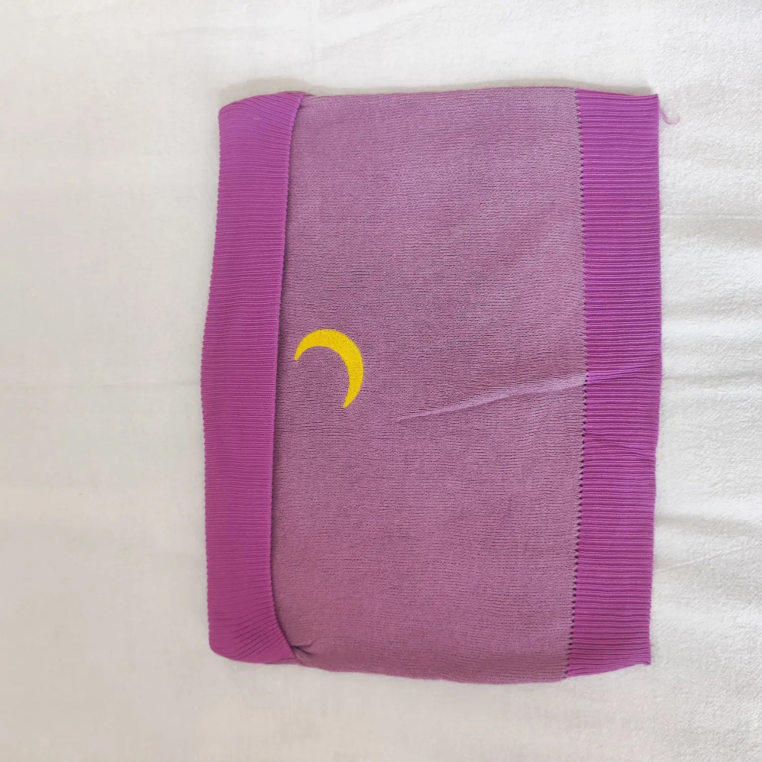 Flat lay front purple knit strapless tube top featuring yellow moon embroidery