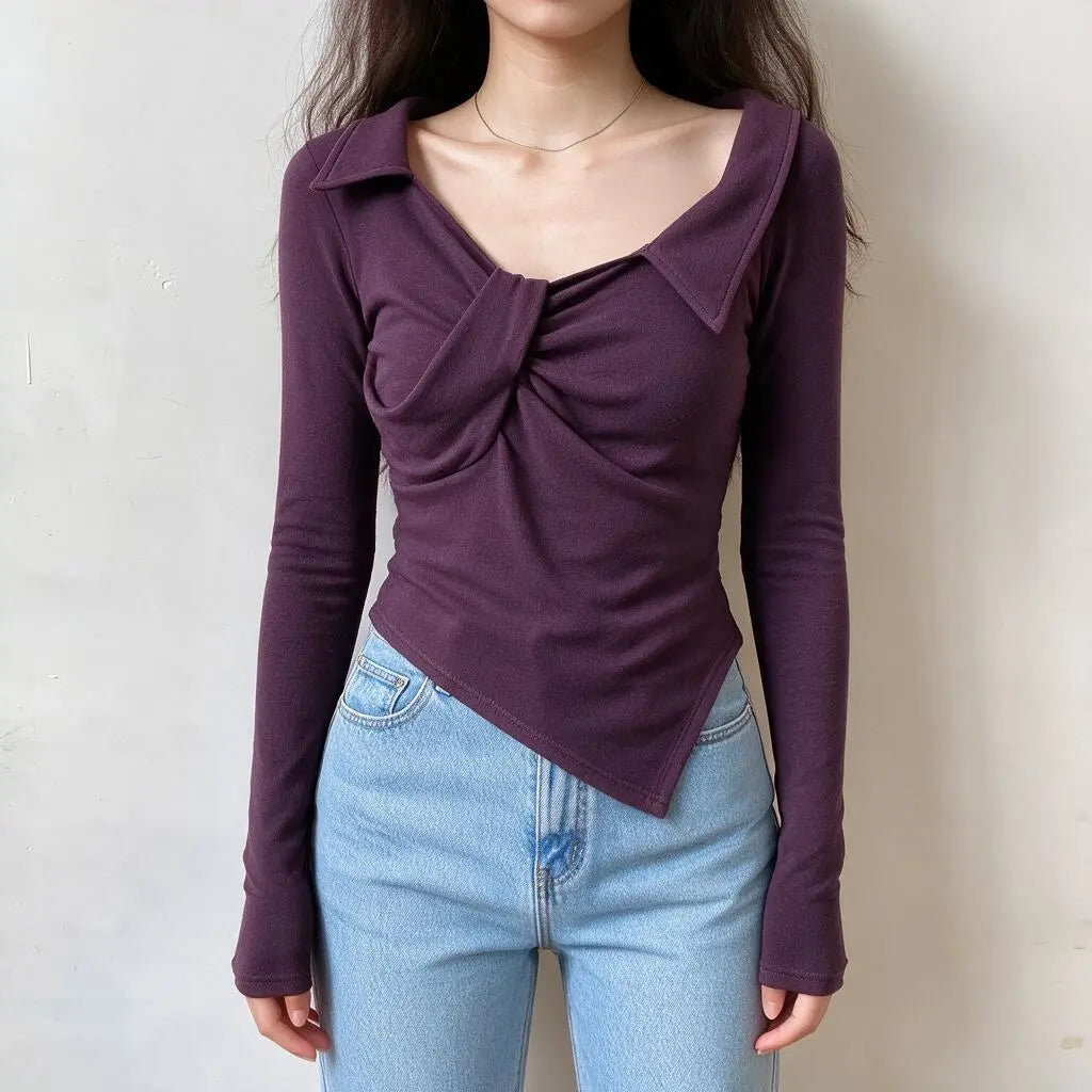 Dark purple long sleeve fitted top with collar and twist front detail, asymmetrical hem