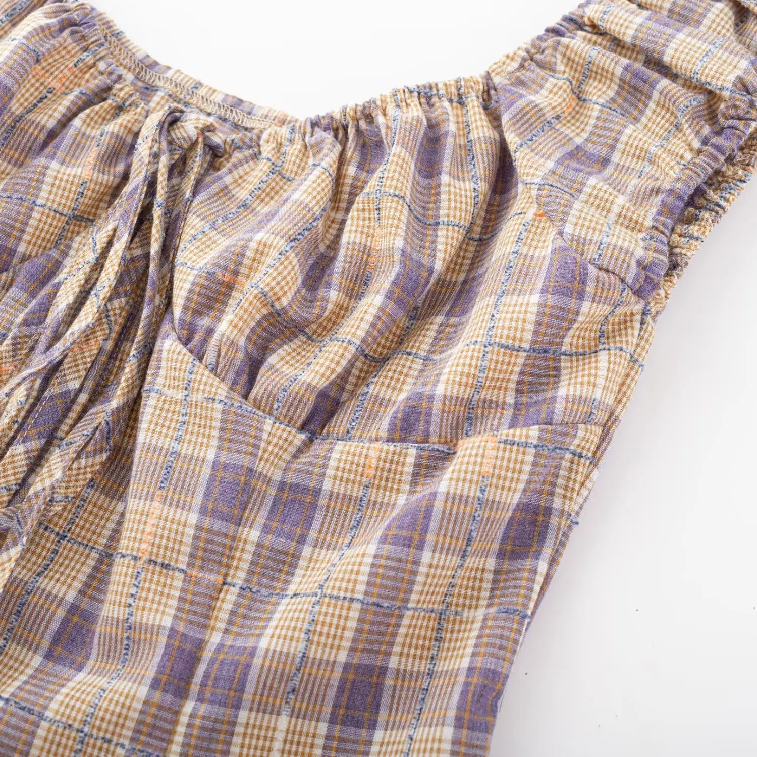 Purple yellow plaid crop top u-neck bust macro shot, elastic gathered edge vintage plaid woven fabric print detail