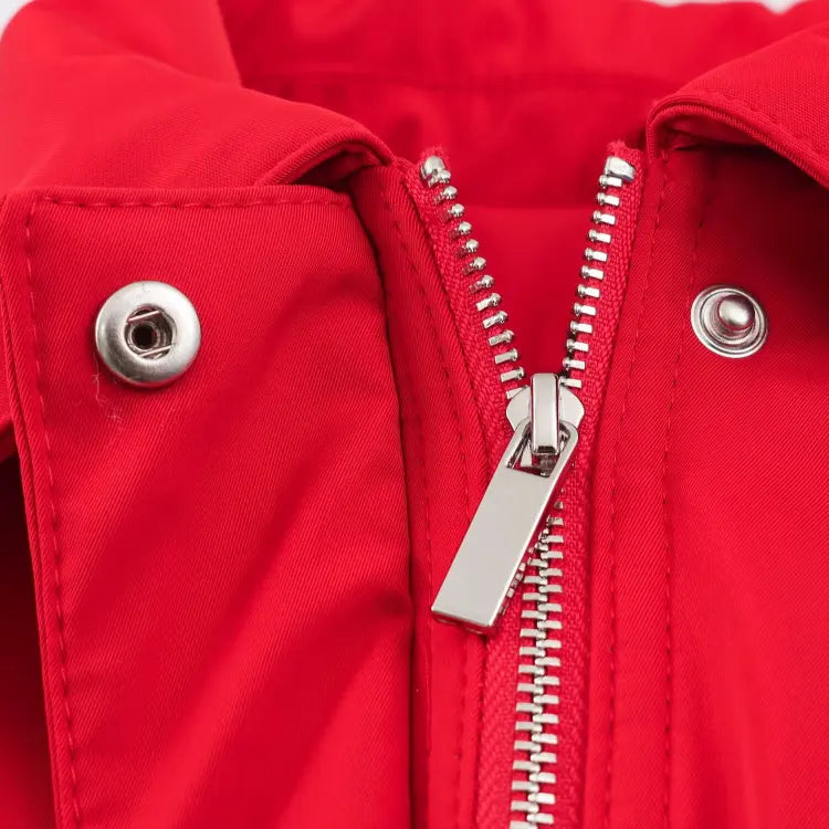 Close-up of metal zipper and snap buttons