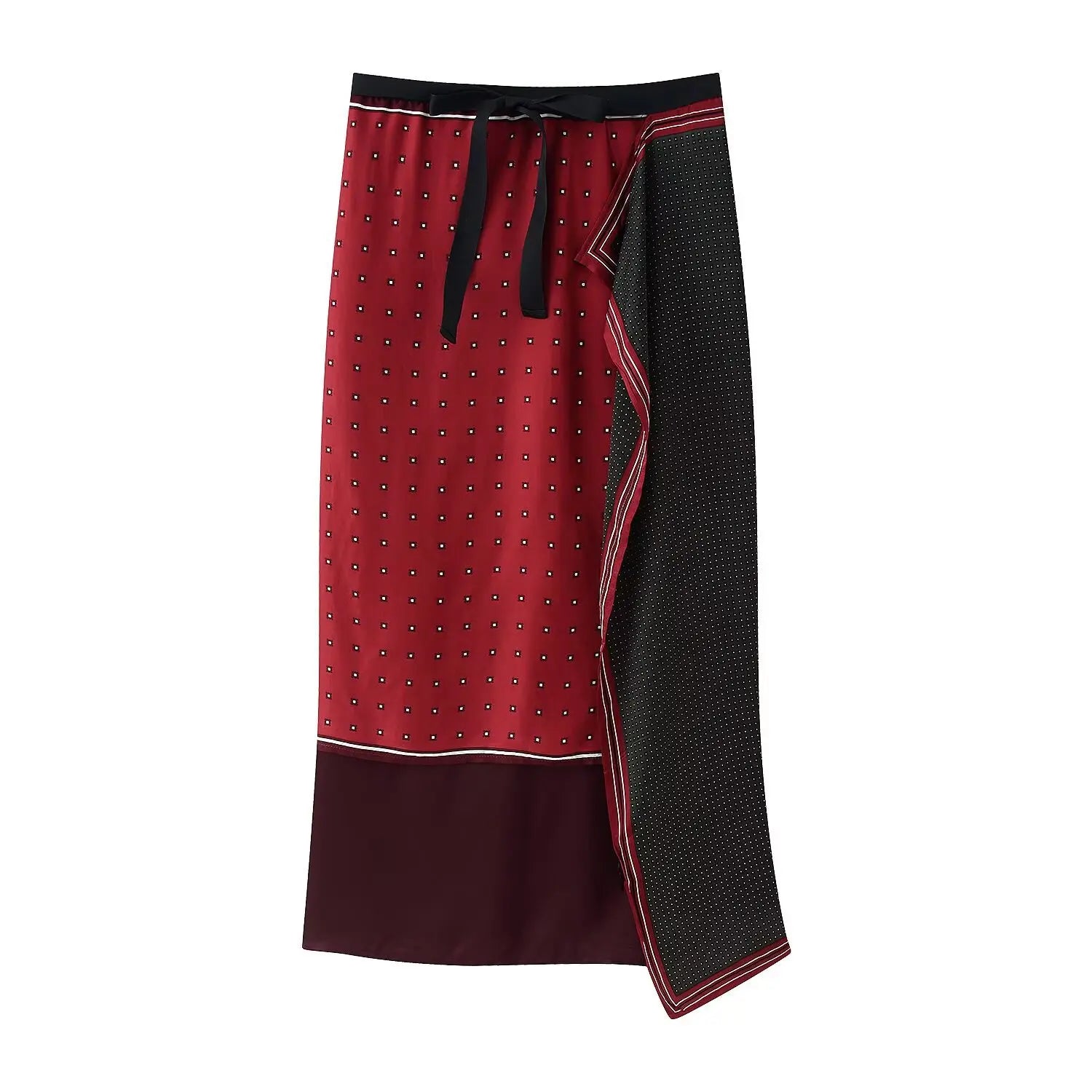 Studio white background full front shot of red black reversible wrap midi skirt, elastic waistband with self tie ribbon, two-sided geometric dot print, contrast piping trim, asymmetrical wrap hem