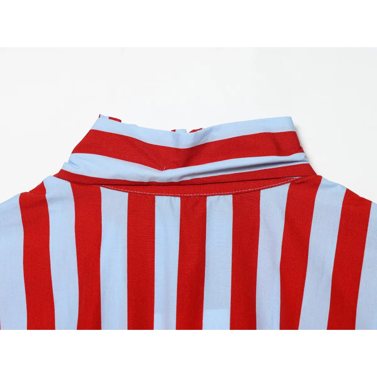 Close-up of the top's back collar, showing the striped pattern and construction.