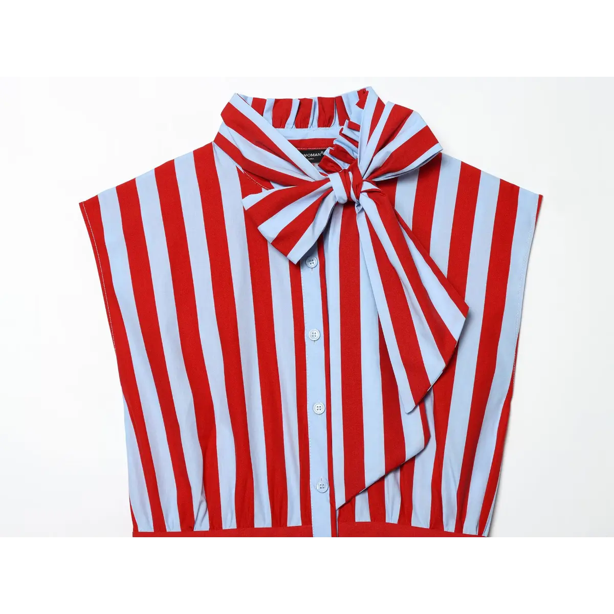 Top view of the front, showing the bow, button placket, and armholes.