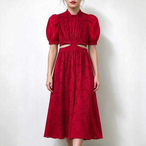 Model wearing red floral jacquard maxi dress, stand ruffle collar, short puff sleeves, waist cutout detail, flowy full maxi skirt, plain white background