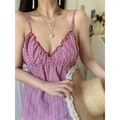 Red white gingham floral scalloped cami top half body vibe shot, v-neck gathered loose babydoll fit, layered heart gold necklaces soft girly indoor styling