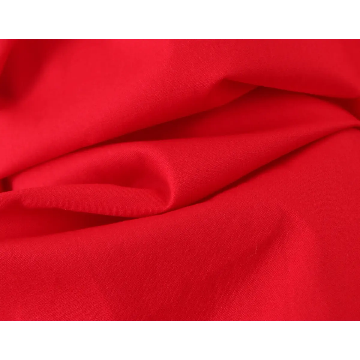  Close-up of the smooth, crisp fabric texture of a bright red halter maxi dress.