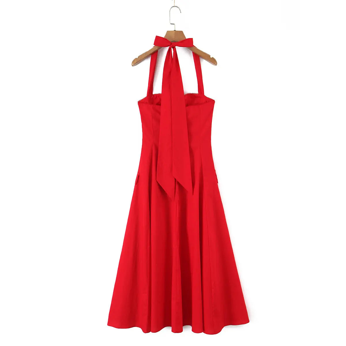  Full back view of a bright red halter maxi dress on a wooden hanger, showing the large bow tie and long hanging ribbons.