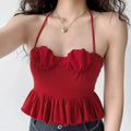 Lifestyle photo vintage red ruched padded bust halter tie peplum ribbed knit cropped cami top