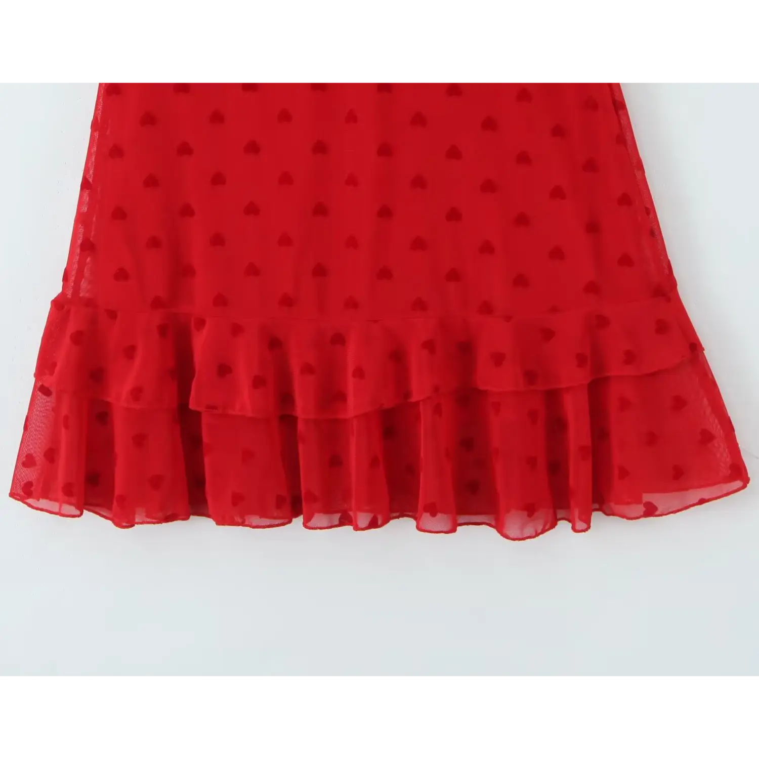 Full view layered ruffle hem red flocked heart mesh cami mini dress hanging display