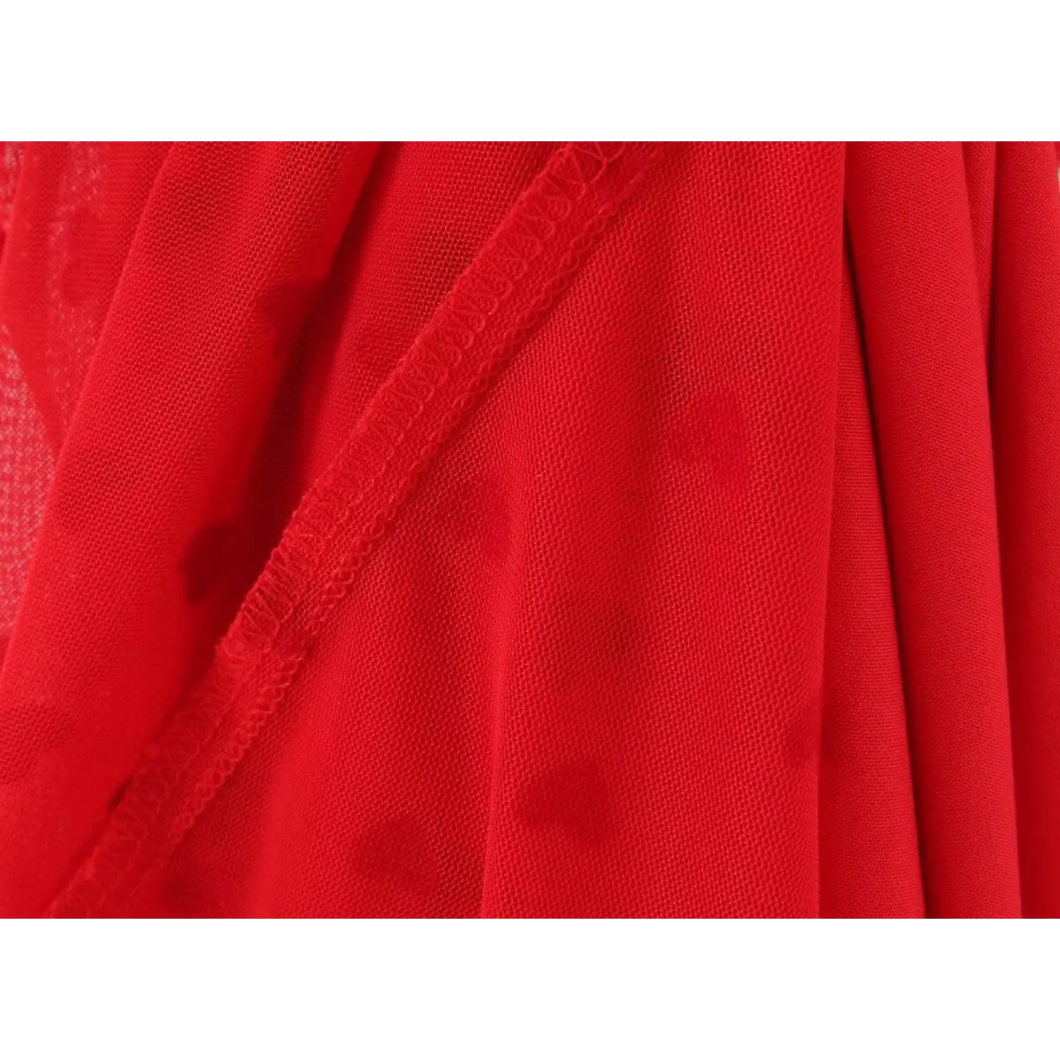 Close‑up interior overlock stitching seam detail red flocked heart mesh cami dress