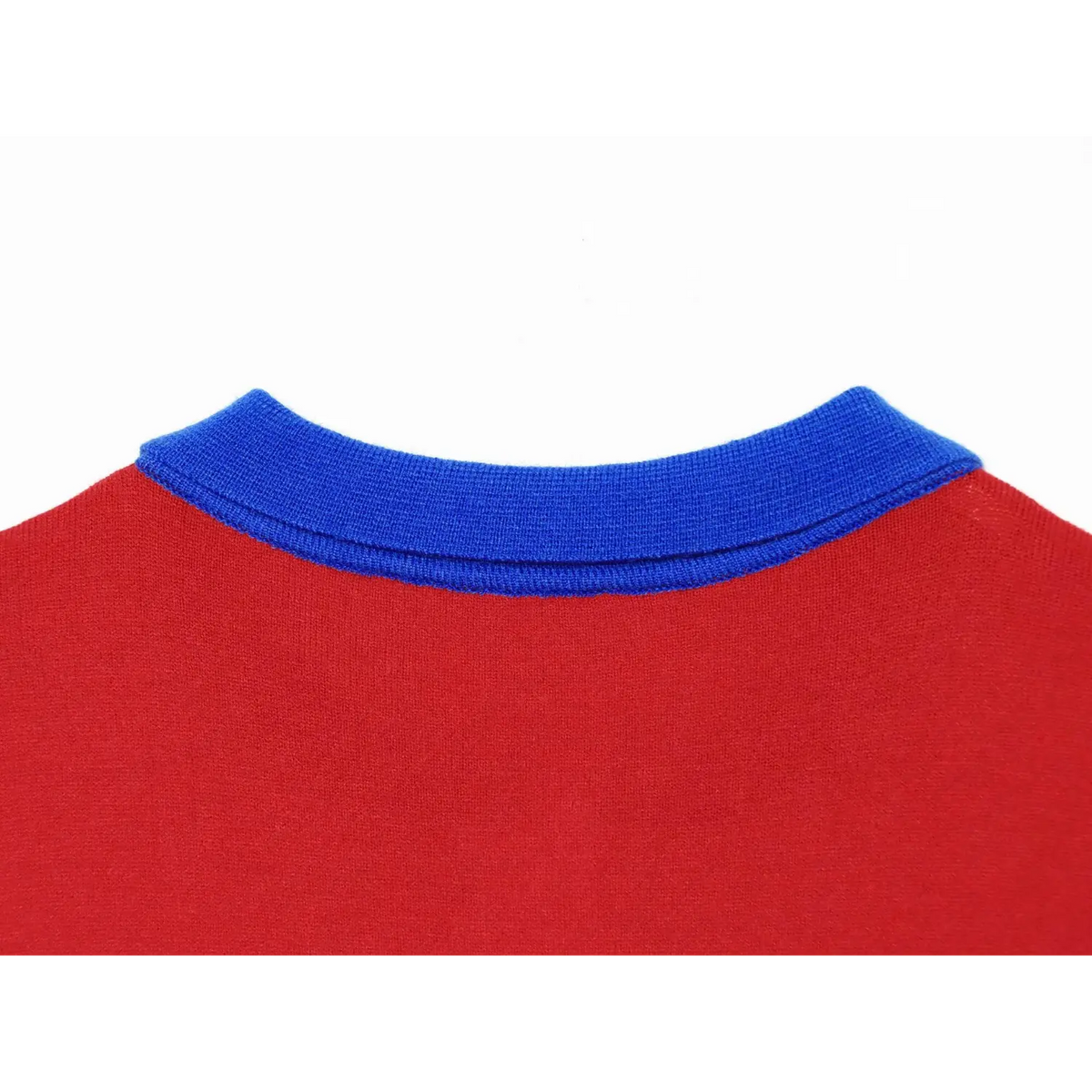 Back neck close-up of bright blue contrast collar on red knit polo top