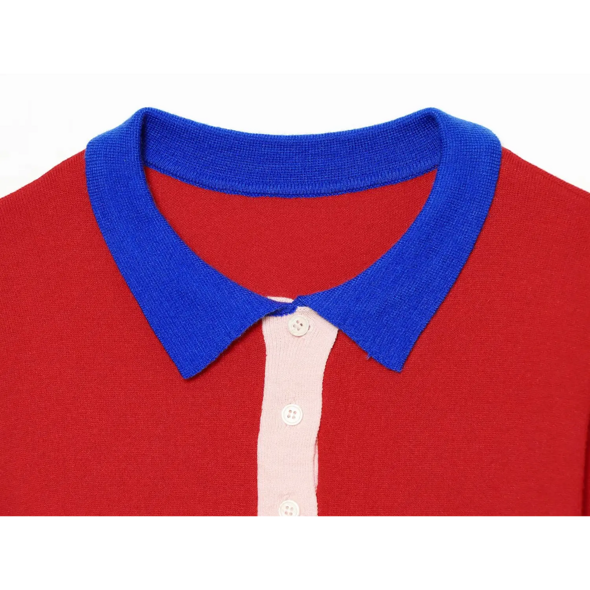 Macro close-up of blue contrast polo collar and pink button placket on red knitted top
