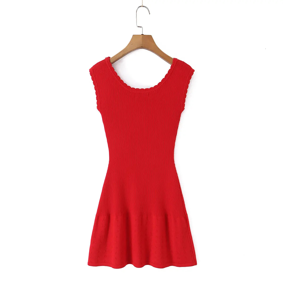Back view of a red ribbed knit mini dress, showing the scalloped neckline and cap sleeves.