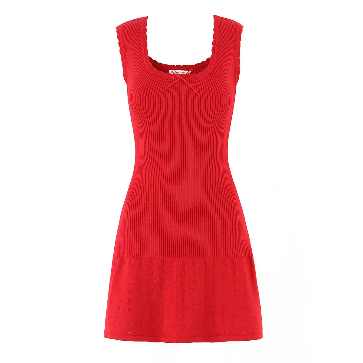 Studio shot of a red ribbed knit mini dress, showing the scalloped neckline, center ribbon bow, fitted bodice, and flared eyelet-knit skirt.