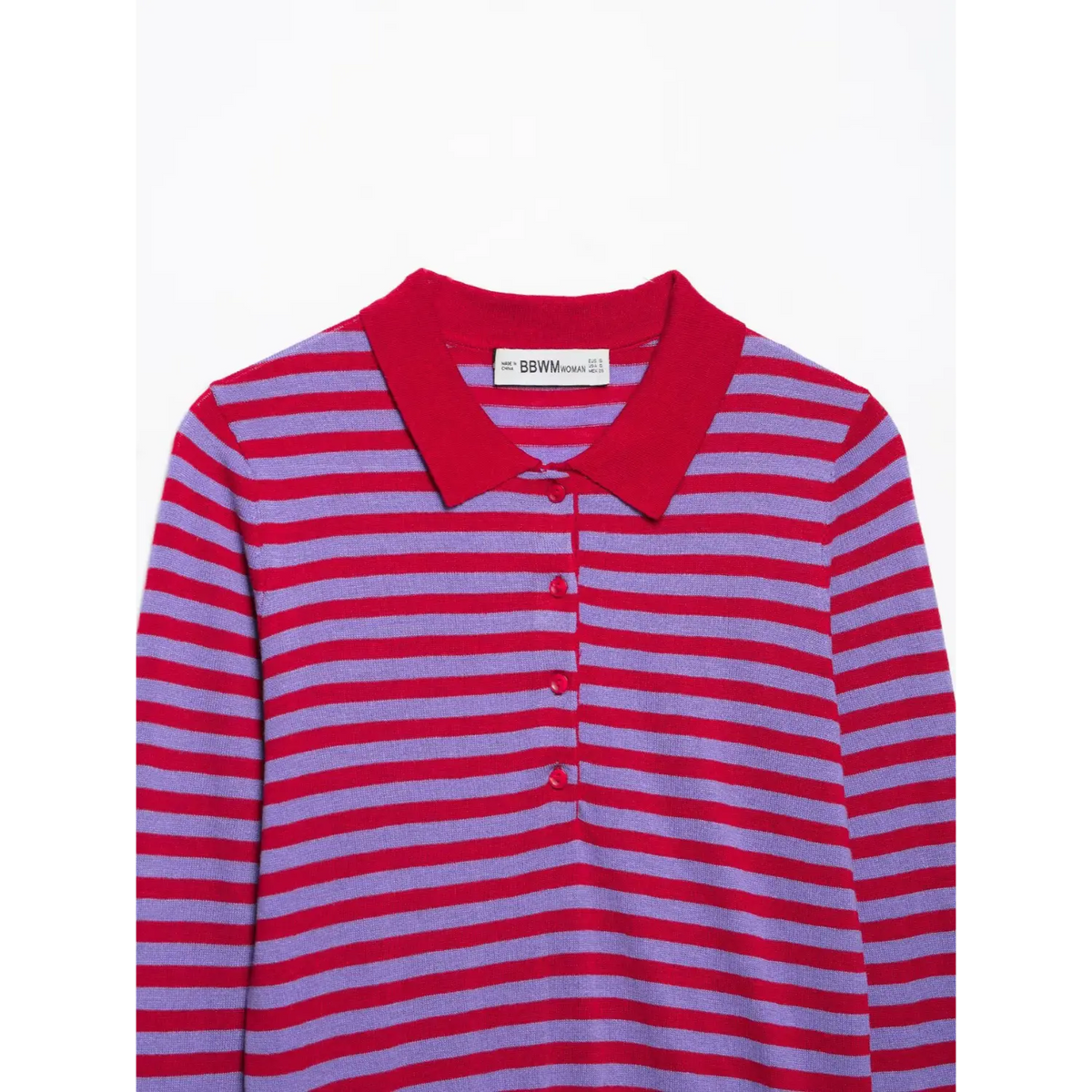 Close-up of red polo collar and button placket on striped knit top with white brand label