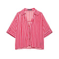 Studio white background full front shot of red pink vertical stripe cropped shirt, lapel notched v neck, partial button placket, roll tab short sleeves, relaxed cropped hem